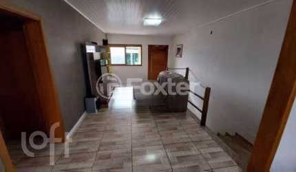 Casa com 4 quartos à venda na Rua Latino Coelho, 294, Estância Velha, Canoas, 180 m2 por R$ 550.000