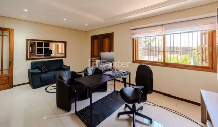 Casa com 4 quartos à venda na Rua Raymundo Luiz Marinho Filho, 289, Parque Santa Fé, Porto Alegre, 247 m2 por R$ 810.000