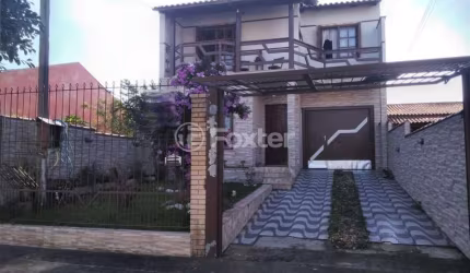 Casa com 3 quartos à venda na Rua Condores, 565, Jardim Algarve, Alvorada, 170 m2 por R$ 508.800