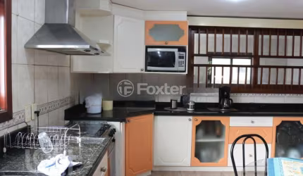 Casa com 4 quartos à venda na Avenida Guido Mondin, 743, São Geraldo, Porto Alegre, 260 m2 por R$ 1.499.000