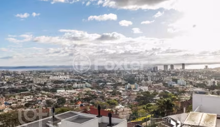 Casa em condomínio fechado com 5 quartos à venda na Rua Alcebíades Antônio dos Santos, 356, Nonoai, Porto Alegre, 600 m2 por R$ 2.000.000