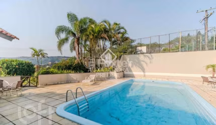 Casa em condomínio fechado com 3 quartos à venda na Rua Manoel Lopes Meirelles, 287, Jardim Itu Sabará, Porto Alegre, 106 m2 por R$ 650.000