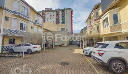 Casa em condomínio fechado com 2 quartos à venda na Rua Antônio Fonseca Barcelos, 200, Marechal Rondon, Canoas, 117 m2 por R$ 430.000
