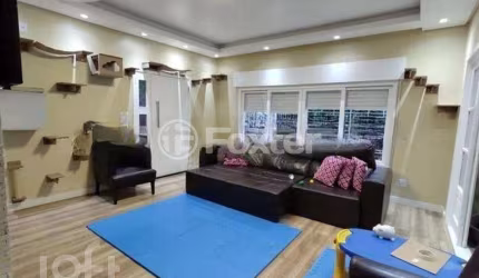 Casa com 3 quartos à venda na Rua Eustáquio Inácio da Silveira, 365, Belém Novo, Porto Alegre, 196 m2 por R$ 658.000