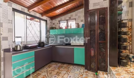 Casa com 5 quartos à venda na Rua Doutor Mário Totta, 2686, Tristeza, Porto Alegre, 310 m2 por R$ 1.300.000