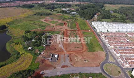 Terreno em condomínio fechado à venda na Avenida Hispânica, 495, Guajuviras, Canoas, 200 m2 por R$ 155.000