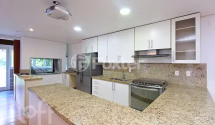 Casa em condomínio fechado com 3 quartos à venda na Avenida Juca Batista, 8000, Belém Novo, Porto Alegre, 240 m2 por R$ 1.368.000