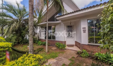 Casa em condomínio fechado com 4 quartos à venda na Rodovia Tapir Rocha, 6614, São Lucas, Viamão, 300 m2 por R$ 970.000