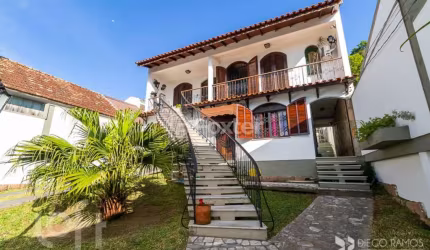 Casa com 3 quartos à venda na Rua Liberal, 1085, Tristeza, Porto Alegre, 311 m2 por R$ 800.000