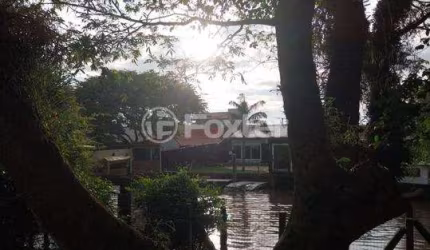 Casa com 3 quartos à venda na Rua Mexiana, 435, Arquipélago, Porto Alegre, 90 m2 por R$ 500.000