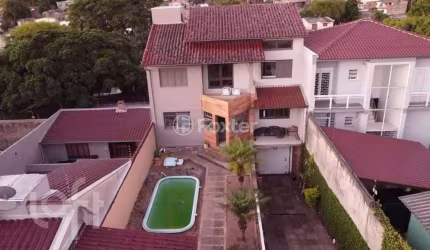 Casa com 3 quartos à venda na Rua Gregório da Fonseca, 167, Nonoai, Porto Alegre, 200 m2 por R$ 667.800