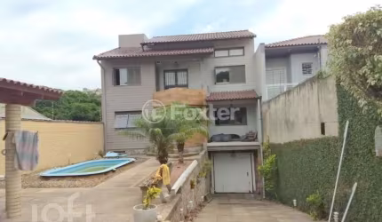 Casa com 3 quartos à venda na Rua Gregório da Fonseca, 167, Nonoai, Porto Alegre, 200 m2 por R$ 667.800
