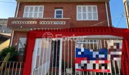 Casa com 4 quartos à venda na Rua Buarque de Macedo, 424, São Geraldo, Porto Alegre, 97 m2 por R$ 300.000