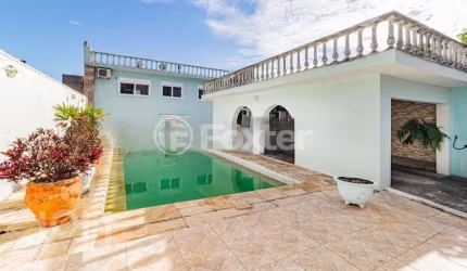 Casa com 4 quartos à venda na Rua Miracema, 134, Chácara das Pedras, Porto Alegre, 280 m2 por R$ 845.750