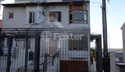 Casa com 3 quartos à venda na Rua Homero Só Jobim, 176, Ipanema, Porto Alegre, 200 m2 por R$ 640.000