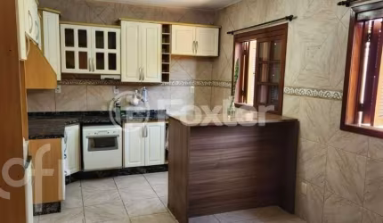 Casa em condomínio fechado com 3 quartos à venda na Rua Giobatta Giuseppe Petracco, 220, Vila Nova, Porto Alegre, 155 m2 por R$ 579.900