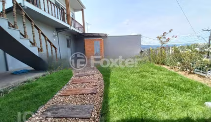 Casa com 3 quartos à venda na Rua Venâncio Aires, 935, Canudos, Novo Hamburgo, 253 m2 por R$ 689.700