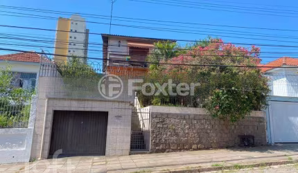 Casa com 5 quartos à venda na Rua Caldre e Fião, 54, Santo Antônio, Porto Alegre, 160 m2 por R$ 650.000