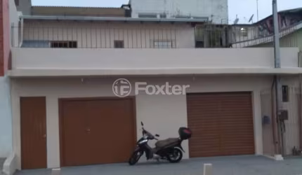 Casa com 3 quartos à venda na Avenida Tiradentes, 980, Aparecida, Alvorada, 215 m2 por R$ 424.000
