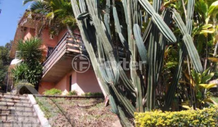 Casa com 4 quartos à venda na Rua Alcebíades Antônio dos Santos, 260, Nonoai, Porto Alegre, 240 m2 por R$ 900.000