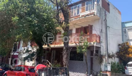 Casa com 2 quartos à venda na Avenida Nova York, 571, Auxiliadora, Porto Alegre, 208 m2 por R$ 840.000