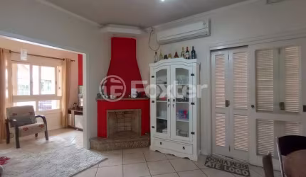Casa com 3 quartos à venda na Rua Professor Eusébio Bastiani, 91, Dom Feliciano, Gravataí, 128 m2 por R$ 912.000