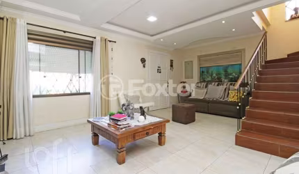 Casa com 3 quartos à venda na Rua Monteiro Lobato, 303, Partenon, Porto Alegre, 308 m2 por R$ 1.100.000