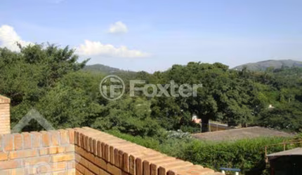 Casa em condomínio fechado com 3 quartos à venda na Avenida Vicente Monteggia, 2212, Cavalhada, Porto Alegre, 139 m2 por R$ 700.000