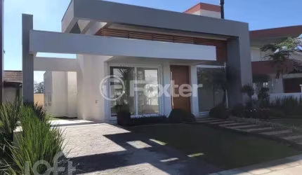 Casa em condomínio fechado com 3 quartos à venda na Avenida Central, 2000, Zona Nova, Capão da Canoa, 180 m2 por R$ 1.550.000