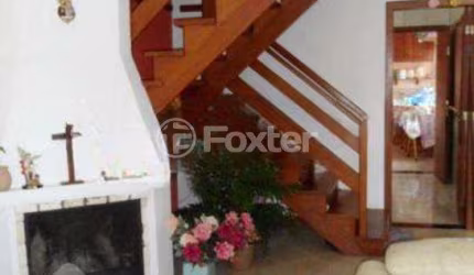 Casa em condomínio fechado com 3 quartos à venda na Rua Osório Mendes Ouriques, 330, Guarujá, Porto Alegre, 162 m2 por R$ 370.000