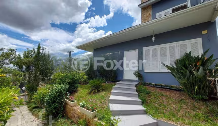Casa em condomínio fechado com 4 quartos à venda na Avenida Protásio Alves, 12000, Rio Branco, Porto Alegre, 312 m2 por R$ 1.990.000