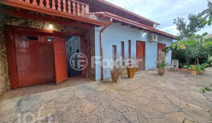Casa com 4 quartos à venda na Rua das Araras, 1650, Harmonia, Canoas, 371 m2 por R$ 841.000