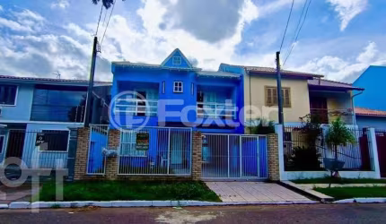 Casa com 4 quartos à venda na Rua Elis Regina, 110, Harmonia, Canoas, 167 m2 por R$ 700.000