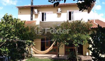 Casa com 4 quartos à venda na Rua Coronel Camisão, 123, Harmonia, Canoas, 130 m2 por R$ 750.000