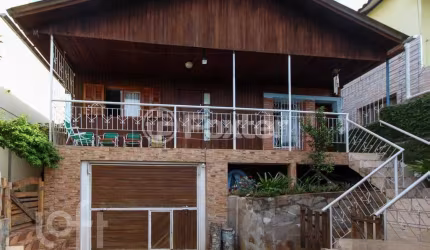 Casa com 4 quartos à venda na Avenida Doutor Sezefredo Azambuja Vieira, 5729, Olaria, Canoas, 300 m2 por R$ 620.000