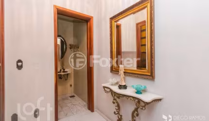 Casa com 5 quartos à venda na Rua Tomaz Edison, 416, Santo Antônio, Porto Alegre, 592 m2 por R$ 850.000
