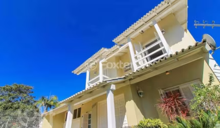 Casa com 3 quartos à venda na Avenida José Gertum, 365, Chácara das Pedras, Porto Alegre, 600 m2 por R$ 2.185.000