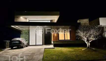 Casa em condomínio fechado com 3 quartos à venda na Rua Honorio Ferreira Da Silva, 2009, Arco Íris, Capão da Canoa, 100 m2 por R$ 2.128.000