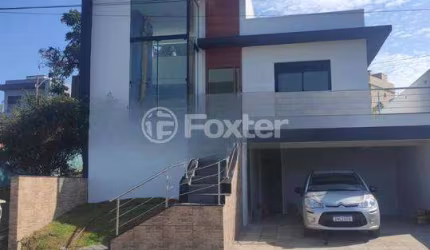 Casa em condomínio fechado com 3 quartos à venda na Rua Lino Estácio dos Santos, 1001, Oriço, Gravataí, 142 m2 por R$ 1.090.000