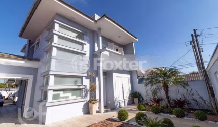 Casa com 3 quartos à venda na Rua Santa Cruz, 967, Niterói, Canoas, 123 m2 por R$ 1.150.000