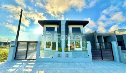 Casa com 3 quartos à venda na Rua Flavio Schaeffer, 325, Guarani, Capão da Canoa, 99 m2 por R$ 780.000