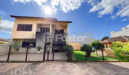 Casa com 3 quartos à venda na Rua João Aluysio Jacob, 381, Fátima, Canoas, 200 m2 por R$ 850.000