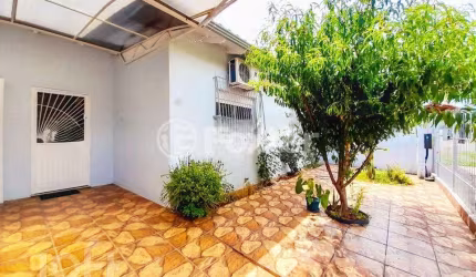 Casa com 3 quartos à venda na Rua das Orquídeas, 48, Harmonia, Canoas, 98 m2 por R$ 575.000