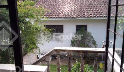 Casa com 3 quartos à venda na Rua Oscar Tollens, 170, Santa Tereza, Porto Alegre, 240 m2 por R$ 540.000