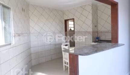 Casa com 3 quartos à venda na Rua Ângelo Passuelo, 220, Vila Nova, Porto Alegre, 320 m2 por R$ 651.000