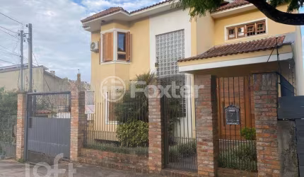 Casa com 3 quartos à venda na Rua Joaquim Cruz, 130, Santo Antônio, Porto Alegre, 330 m2 por R$ 1.400.000