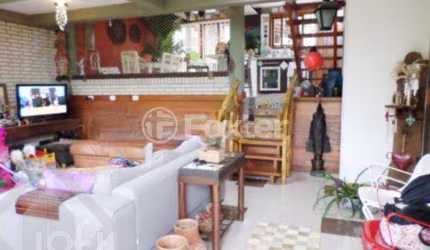 Casa com 3 quartos à venda na Rua Edemilson Santos Silva, 110, Espírito Santo, Porto Alegre, 157 m2 por R$ 850.000