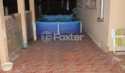 Casa com 4 quartos à venda na Rua Jacundá, 481, Guarujá, Porto Alegre, 405 m2 por R$ 660.000