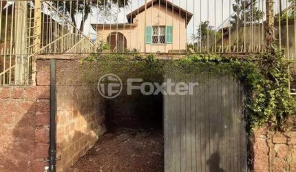 Casa com 4 quartos à venda na Avenida Felipe Weimann, 98, Santa Tereza, Porto Alegre, 180 m2 por R$ 348.000