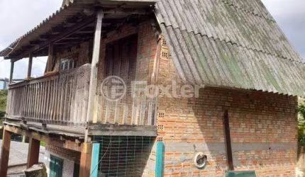 Casa com 3 quartos à venda na Rua Costa Lima, 657, Nonoai, Porto Alegre, 130 m2 por R$ 300.000